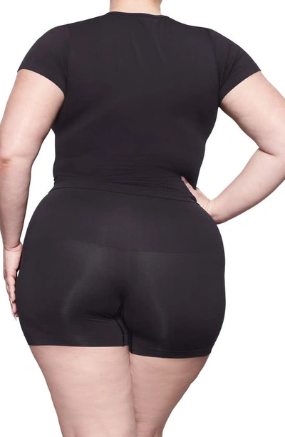 Shop Skims Soft Smoothing Seamless T-shirt In Eclipse