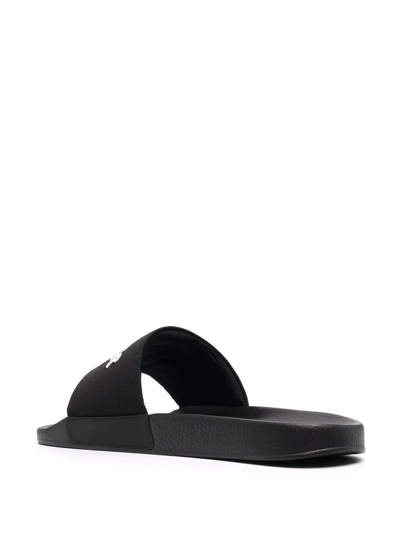 Moncler Logo-embossed Pool Slides In Schwarz