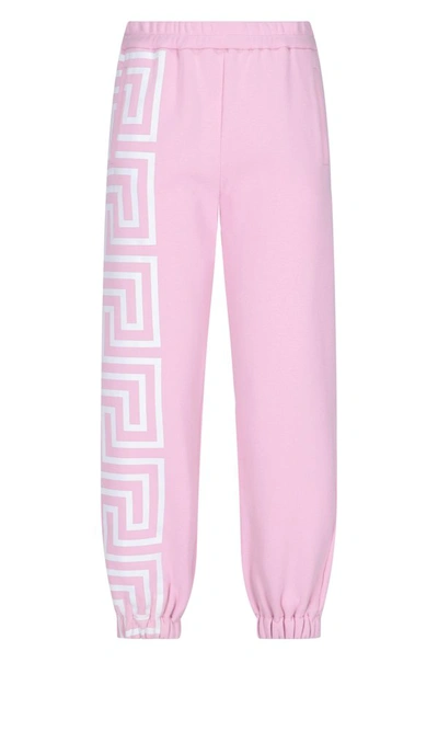 Shop Versace Greca Print Sweatpants In Pink