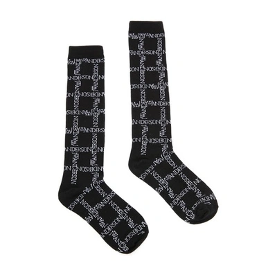 Shop Jw Anderson Logo Grid Long Ankle Socks In Black White