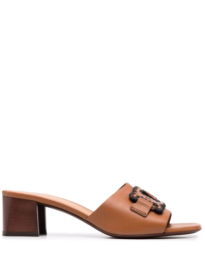 Shop Tod's Leather Chain-appliqué Mules In Brown