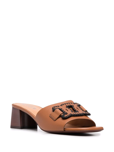 Shop Tod's Leather Chain-appliqué Mules In Brown