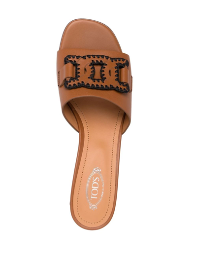 Shop Tod's Leather Chain-appliqué Mules In Brown