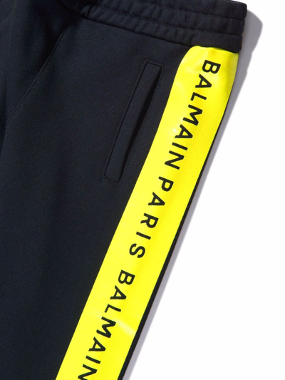 Shop Balmain Logo-tape Tapered Joggers In Black