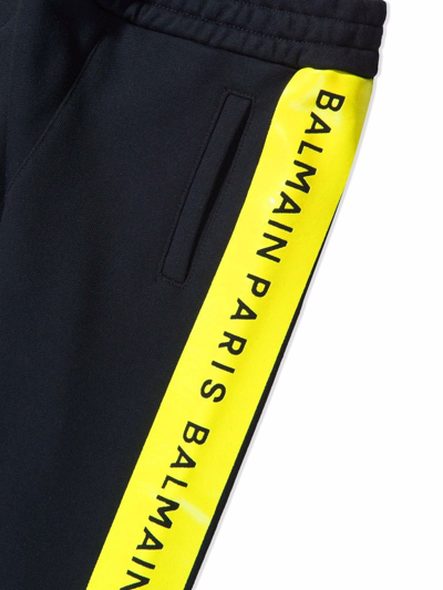 Shop Balmain Teen Logo-tape Tapered Joggers In Black