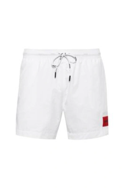 Shop Hugo Quick-dry Swim Shorts With Red Logo Label In White