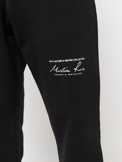 Shop Martine Rose Logo-print Cotton Track Trousers In Schwarz
