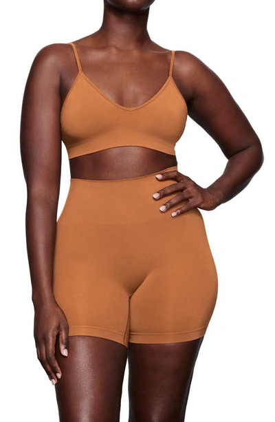 Shop Skims Soft Smoothing Seamless Bralette In Copper