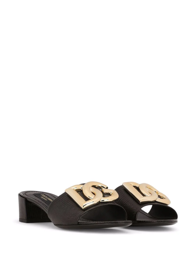 Shop Dolce & Gabbana Dg-logo Iguana-print Mules In Schwarz