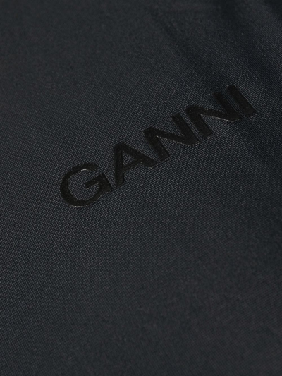 Shop Ganni Chest Logo-print Swimsuit In Schwarz
