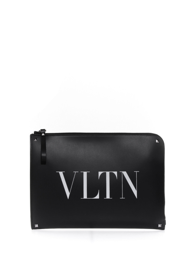 Shop Valentino Clutch Vltn In Leather In Nero Bianco