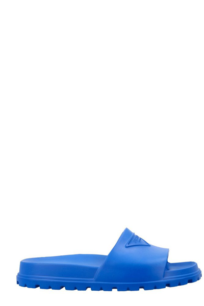 Shop Prada Logo Embossed Slip In Blue
