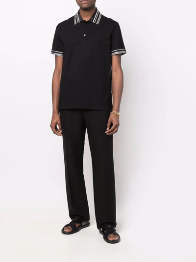 Shop Versace Striped-edge Polo Shirt In Schwarz