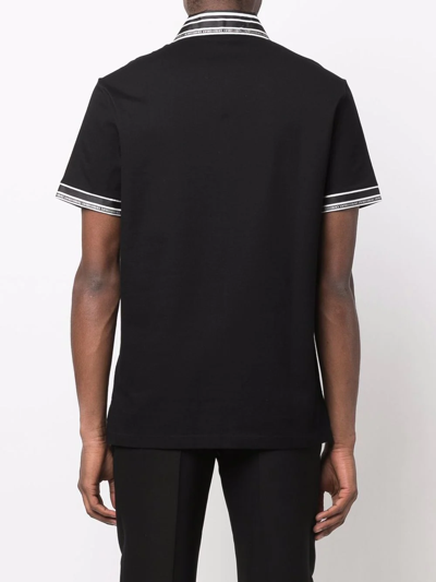 Shop Versace Striped-edge Polo Shirt In Schwarz