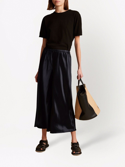 Shop Khaite Lindy Cropped Wide Leg Trousers In Blau