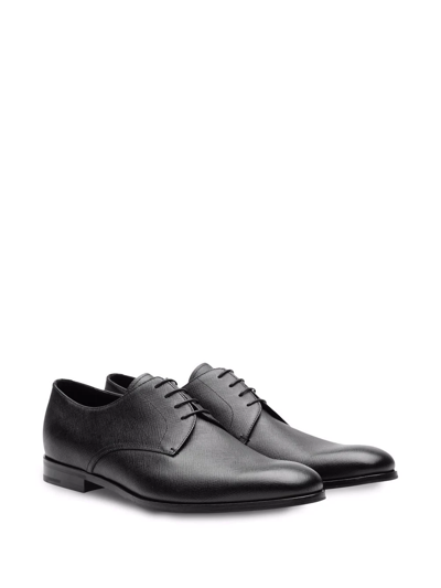 Shop Prada Saffiano Leather Derby Shoes In Black