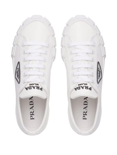 Shop Prada Cassetta Wheel Low-top Sneakers In White