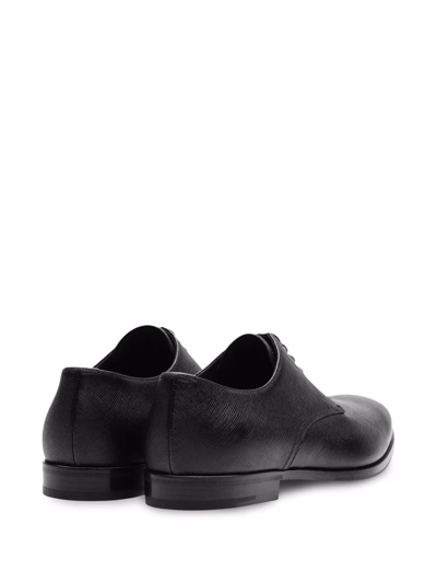 Shop Prada Saffiano Leather Derby Shoes In Black