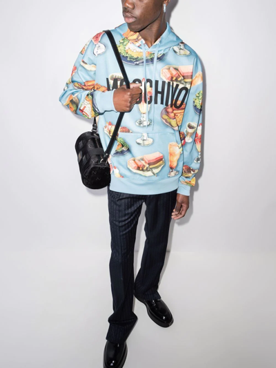 Shop Moschino Diner Group-print Hoodie In Blue