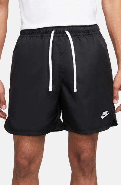 Shop Nike Woven Lined Flow Shorts In Black/ White