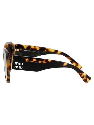Shop Miu Miu Eyewear Sunglasses In 7s00a7 Light Havana