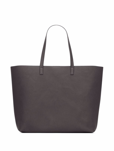 Shop Saint Laurent Embossed-logo Tote Bag In Brown