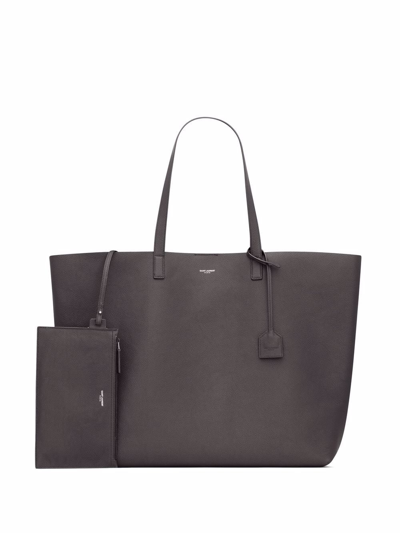 Shop Saint Laurent Embossed-logo Tote Bag In Brown