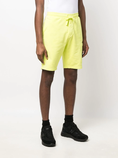 Shop Stone Island Compass-patch Cotton Track Shorts In Yellow