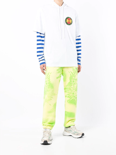 Shop Marcelo Burlon County Of Milan Tie-dye Track Pants In Gelb