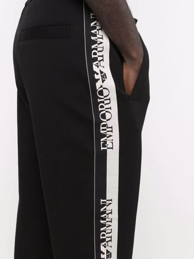 Shop Emporio Armani Logo Tape Track Pants In Schwarz