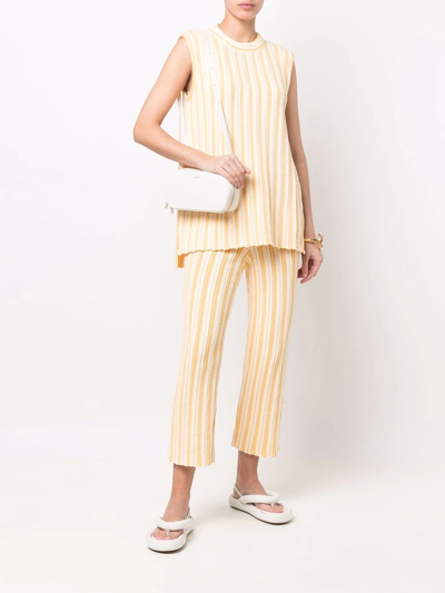 Shop Jil Sander Striped Cropped Trousers In Gelb