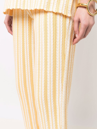 Shop Jil Sander Striped Cropped Trousers In Gelb