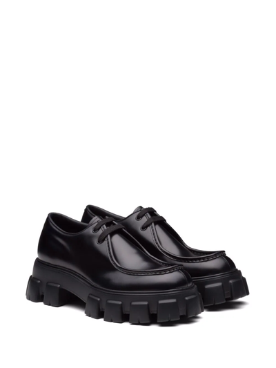Shop Prada Monolith Leather Derby Shoes In Black