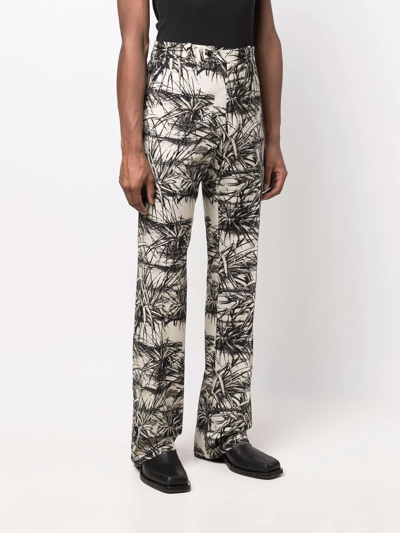 Amiri Graphic-print Flared Trousers In Nude