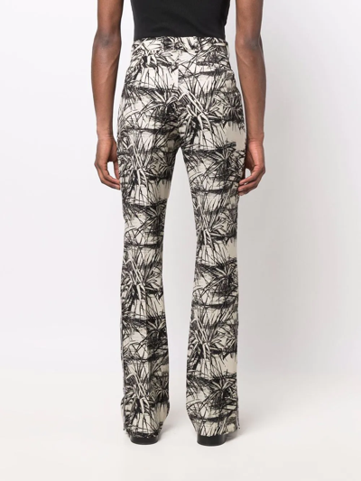 Amiri Graphic-print Flared Trousers In Nude