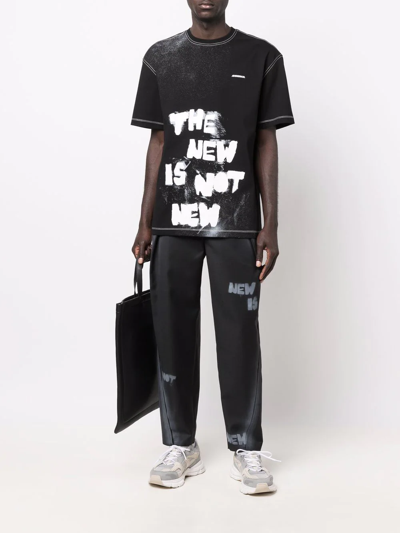 Shop Ader Error Slogan Print Straight-leg Trousers In Black