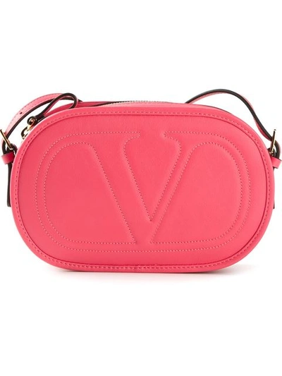 Shop Valentino Embossed Logo Cross Body Bag