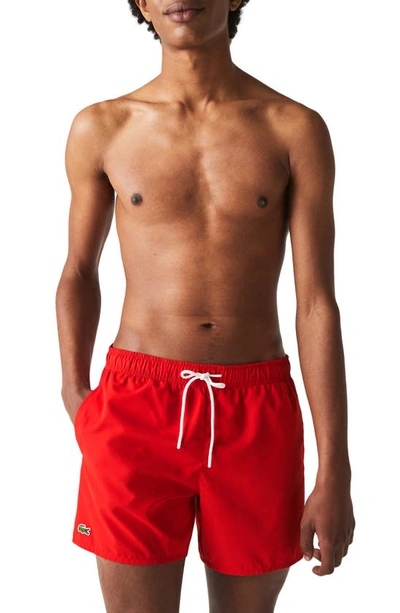 Shop Lacoste Recycled Polyester Swim Trunks In 528 Red/ Navy Blue