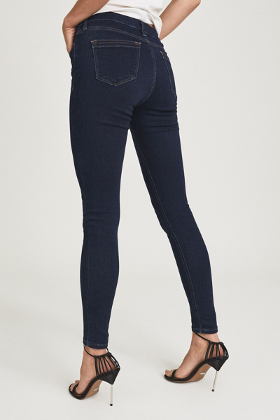 Shop Reiss Lux - Indigo Mid Rise Skinny Jeans, 26l