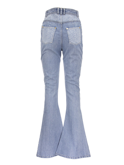 Shop Balmain Monogram-detail Flared Jeans In Light Denim