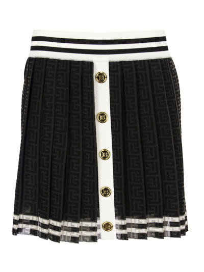 Shop Balmain Monogram Pleated Skirt In White/black