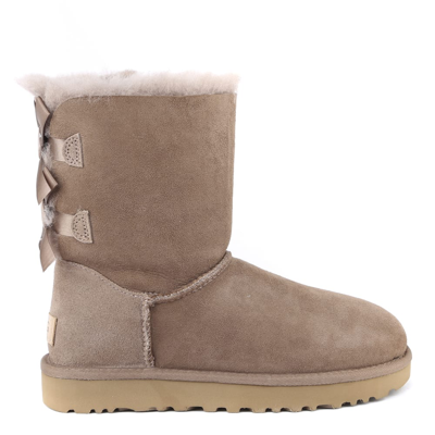 Shop Ugg Bailey Bow Shearling Boot In Taupe