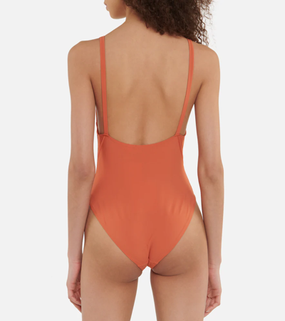 Shop Totême V-neck Swimsuit In Burnt Orange