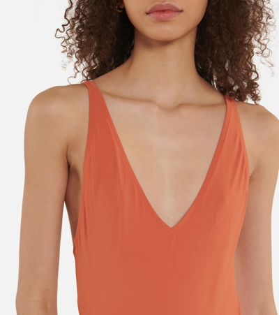Shop Totême V-neck Swimsuit In Burnt Orange