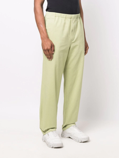 Undercover Logo-patch Trousers In Grün