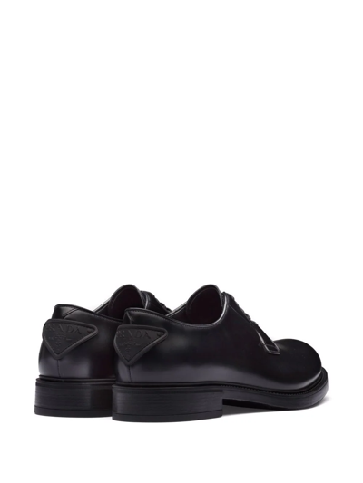 Prada Brushed Leather Derby Shoes In Black | ModeSens