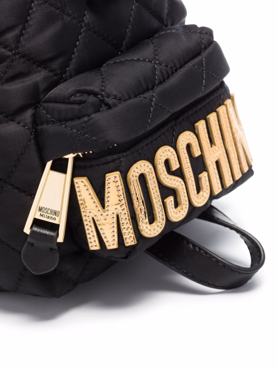 Shop Moschino Quilted Logo-plaque Backpack In Schwarz