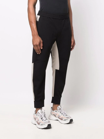 Shop Emporio Armani Panelled-design Track Pants In Schwarz