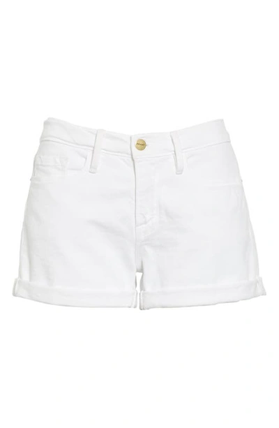 Shop Frame Le Cutoff Denim Shorts In Blanc