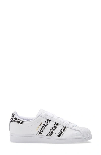 Shop Adidas Originals Superstar Sneaker In White/ Gold/ Black